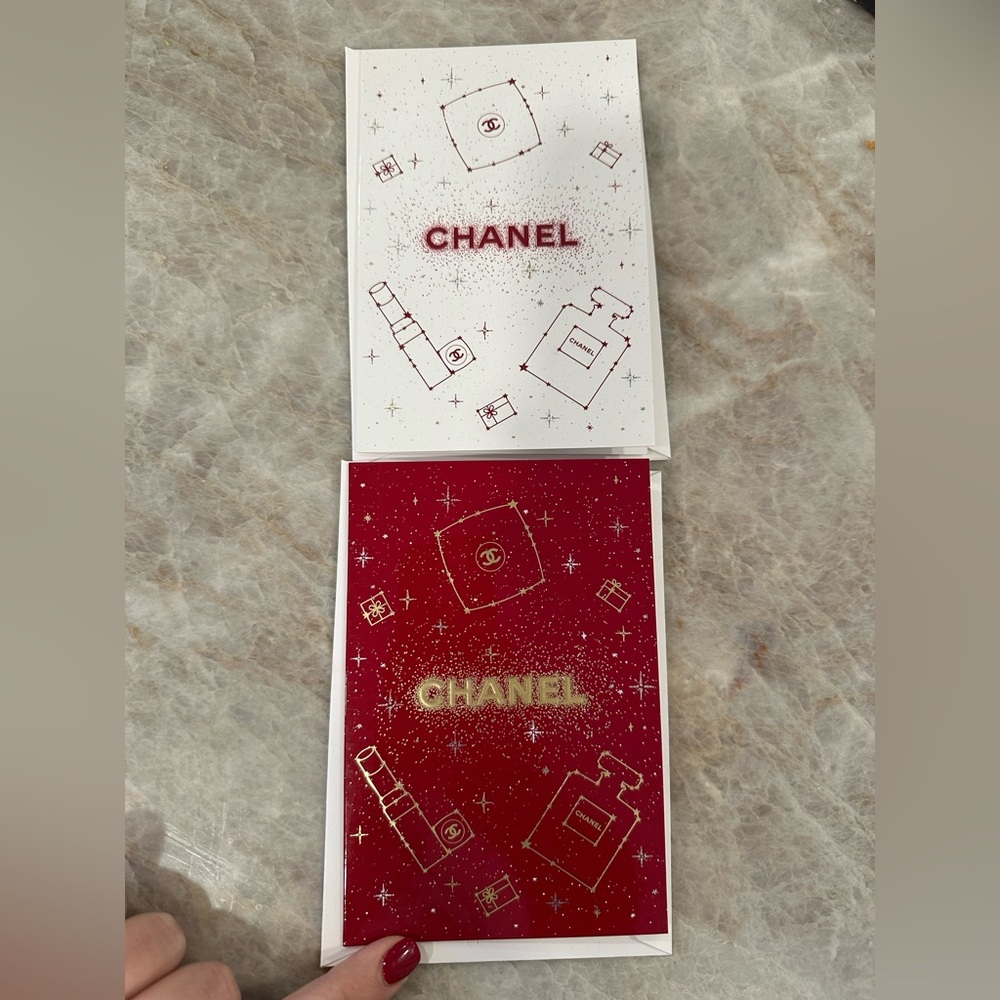 2 Glossy Chanel Cards red and white.